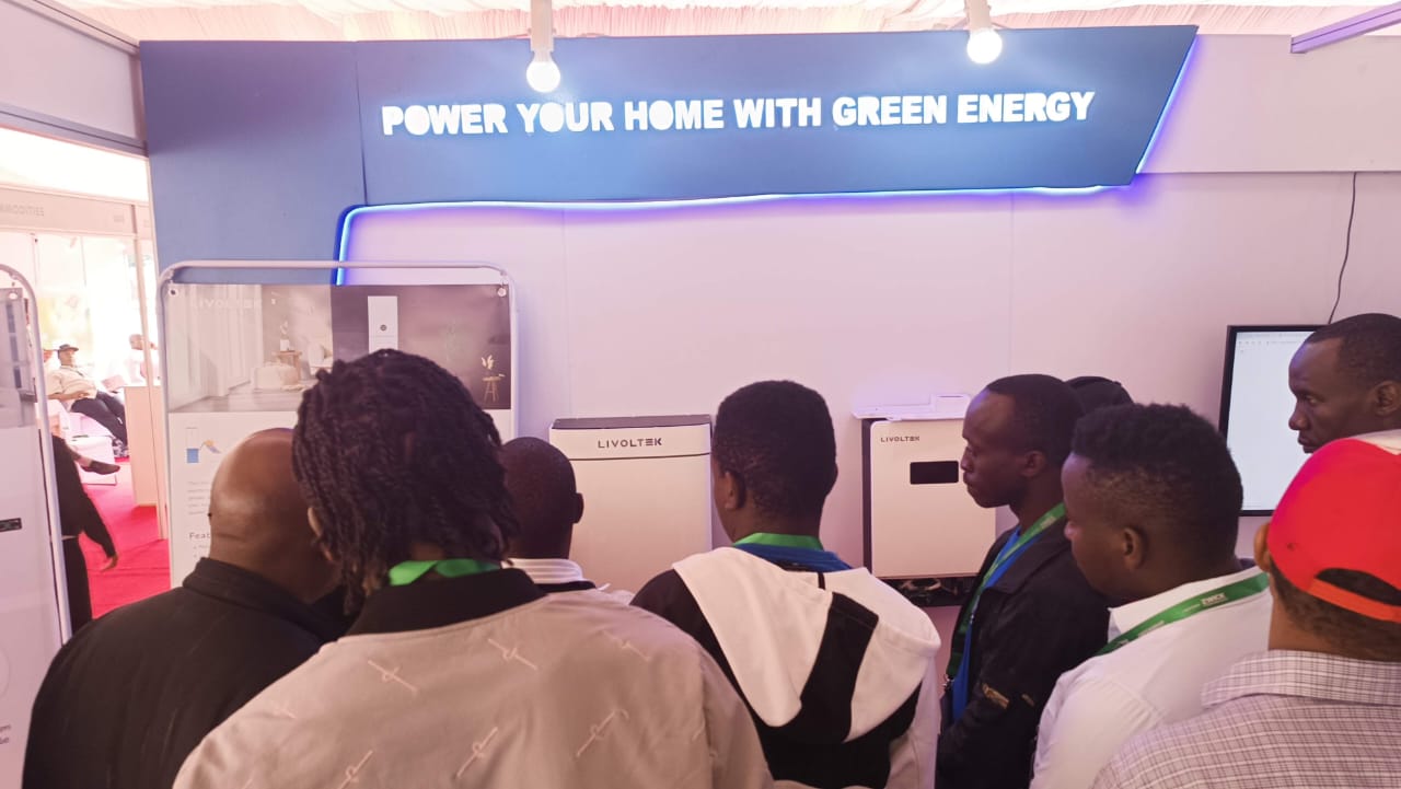 Participants attentive to  Hexing Africa booth  at the 2023 Solar Expo.jpg